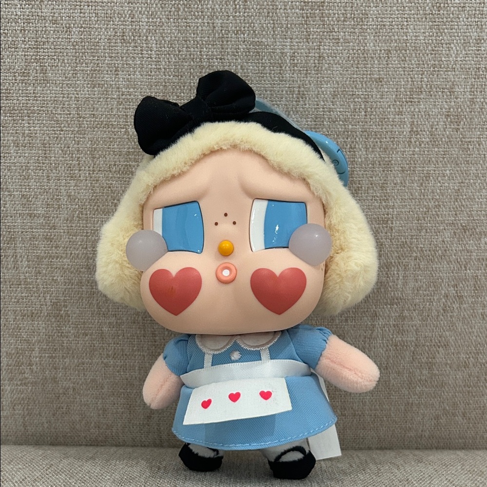 Adorable Blue and Black Stuffed Doll with Heart Details